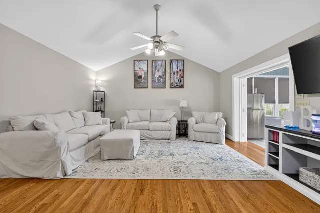 a bathroom with a double vanity sink a mirror a vanity and a shower