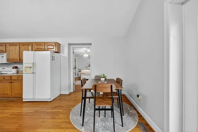 a bathroom with a toilet a sink and shower