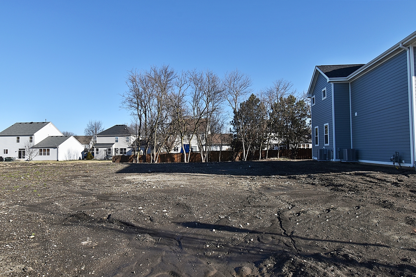 4012 Faith Lane St. Charles, IL 60174 - Photo 13 of 24 a view of a yard with a house in the background