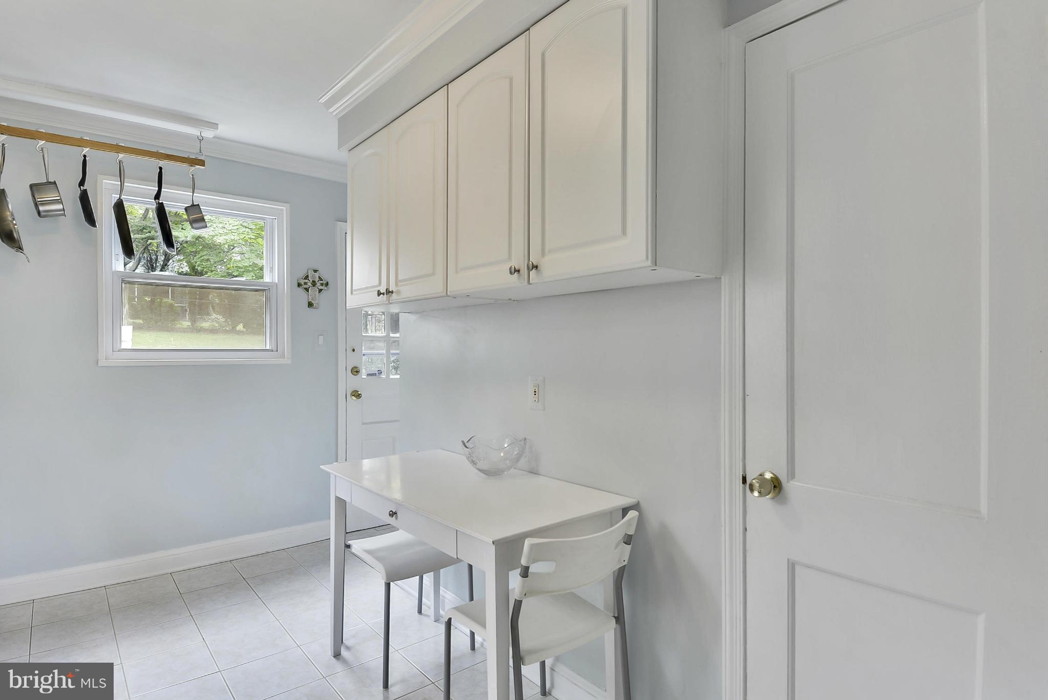 4709 Saul Road Kensington, MD 20895 - Photo 13 of 30 Kitchen w/ ceramic tile flooring and pantry