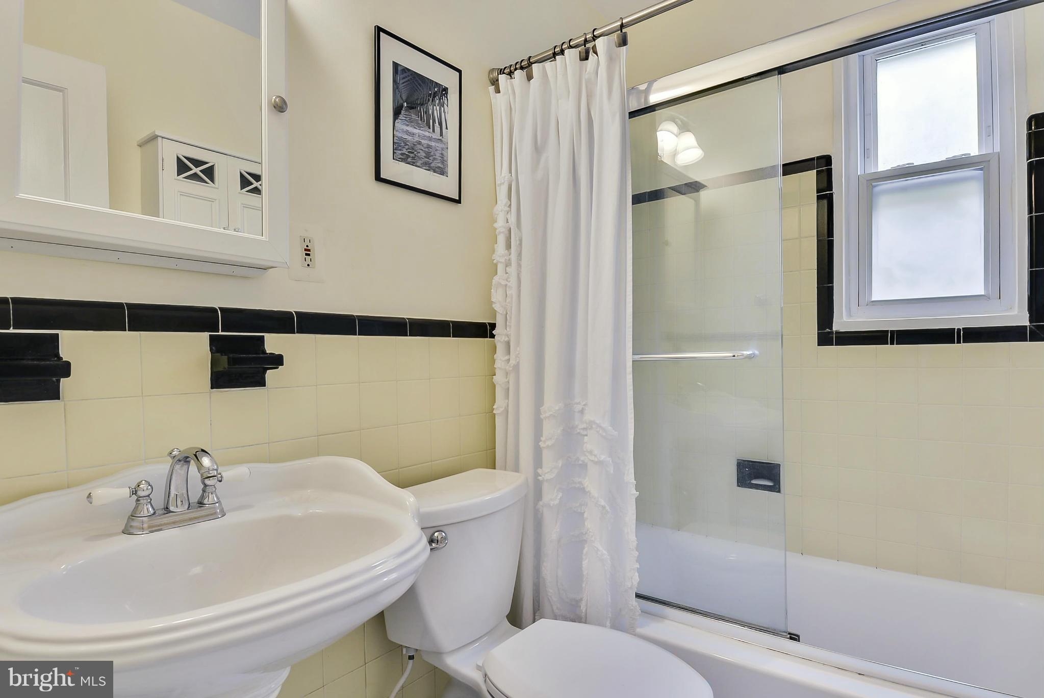 4709 Saul Road Kensington, MD 20895 - Photo 18 of 30 Main level full ceramic tile bath