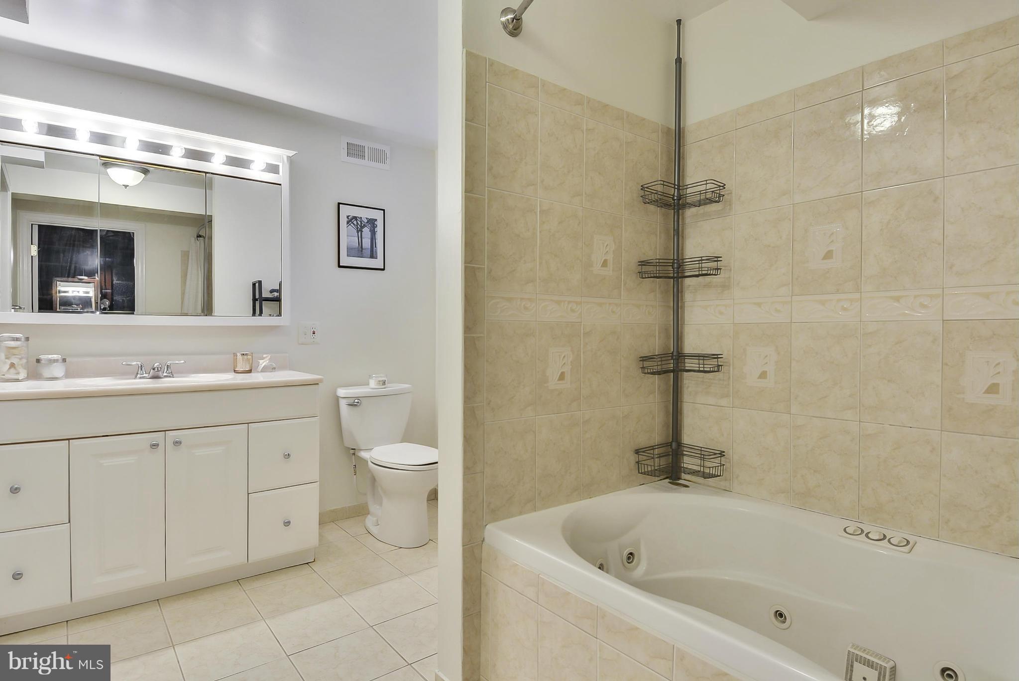 4709 Saul Road Kensington, MD 20895 - Photo 23 of 30 Lower level ceramic tile full bath