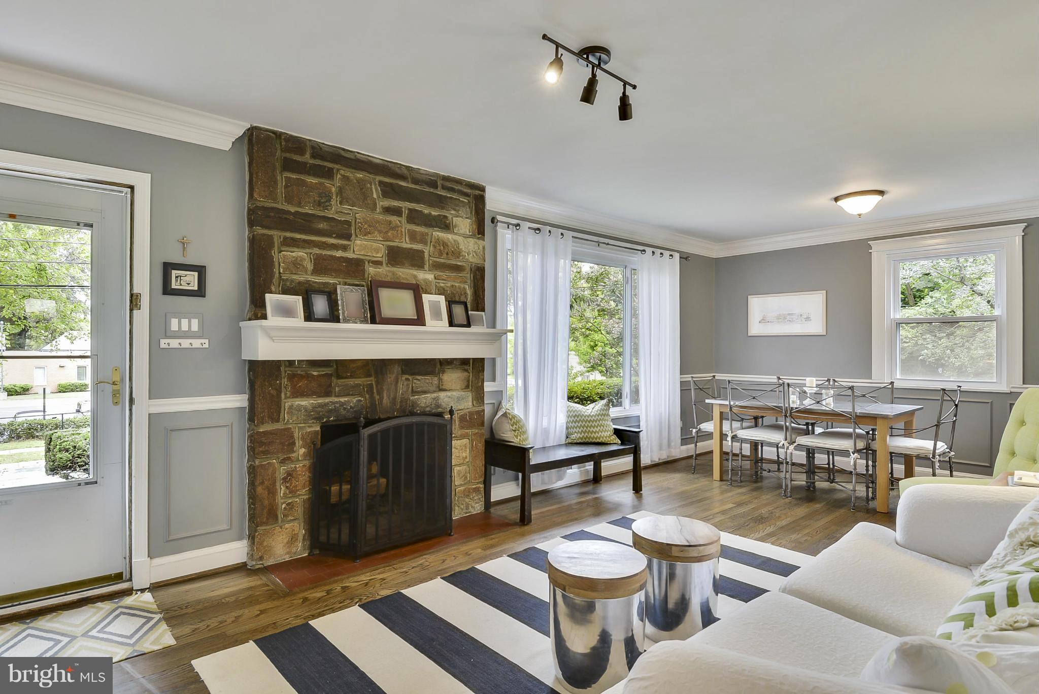 4709 Saul Road Kensington, MD 20895 - Photo 8 of 30 LR w/ floor-to-ceiling stone wood burning FP