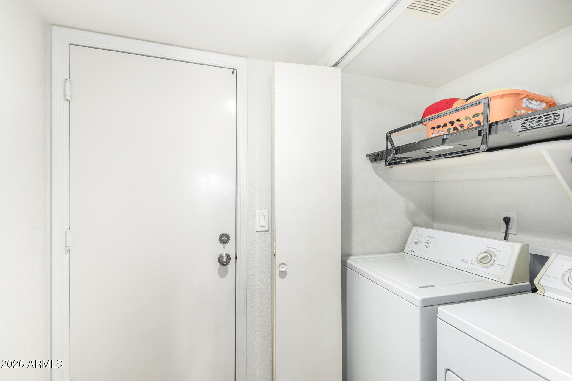 4741 West Marco Polo Road Glendale, AZ 85308 - Photo 21 of 32 a utility room with dryer and washer