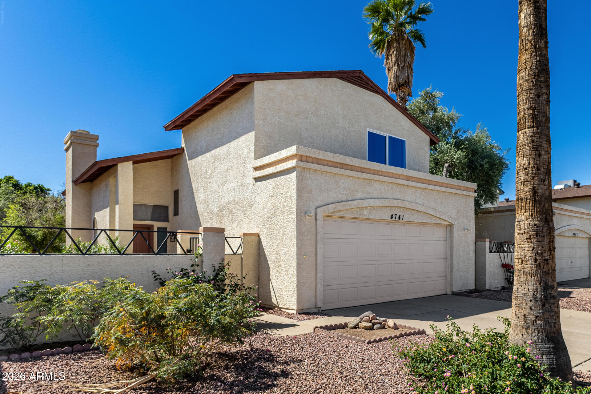4741 West Marco Polo Road Glendale, AZ 85308 - Photo 2 of 32 a view of a house with a yard