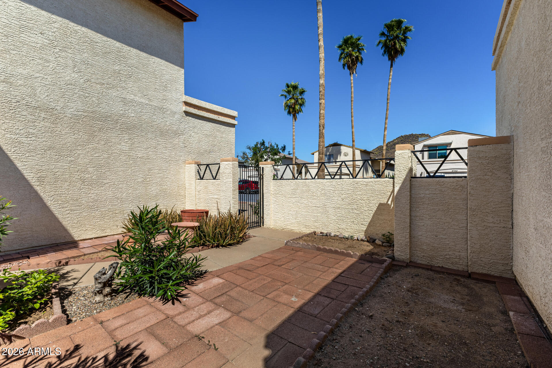 4741 West Marco Polo Road Glendale, AZ 85308 - Photo 5 of 32 a view of balcony with potted plants