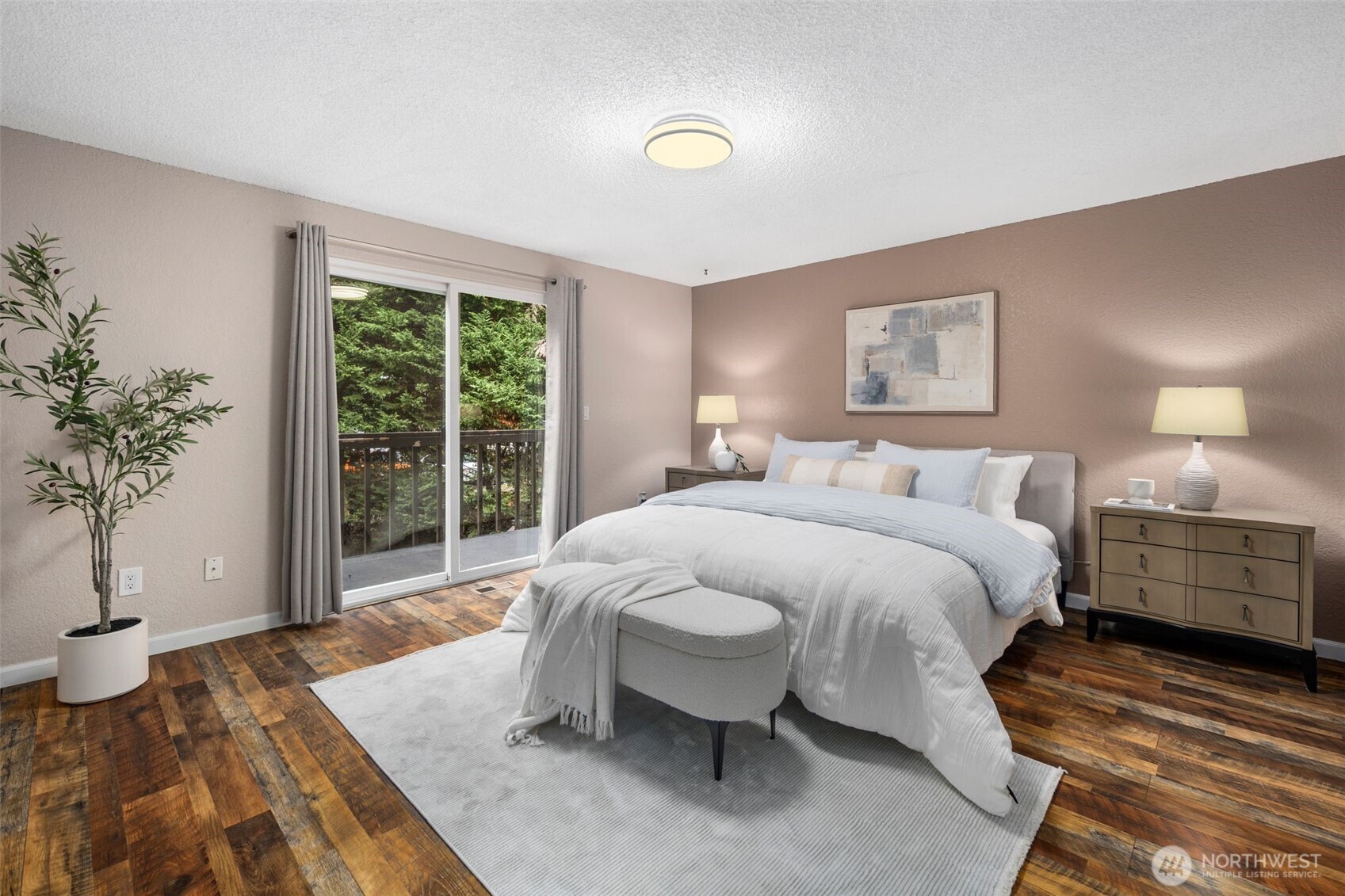 18016 Southeast 147th Street Renton, WA 98059 - Photo 15 of 38 a spacious bedroom with a bed and a large window