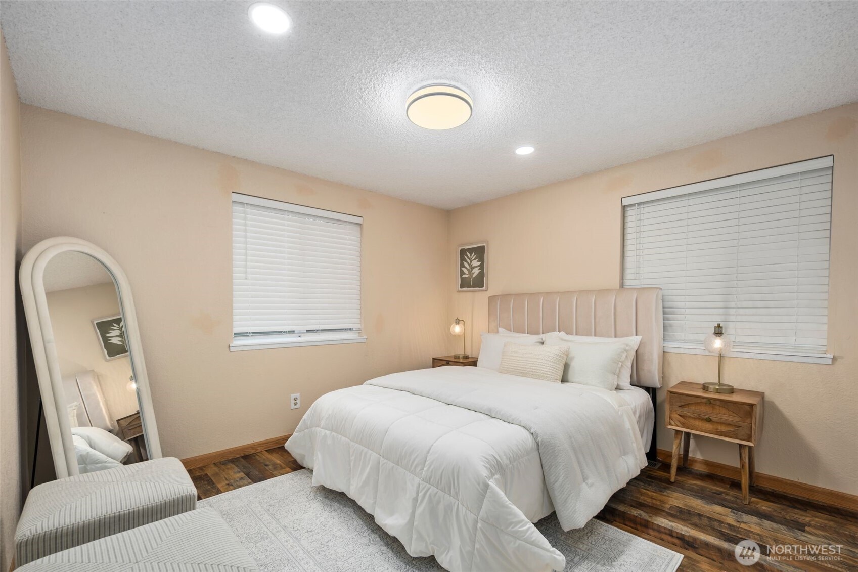 18016 Southeast 147th Street Renton, WA 98059 - Photo 19 of 38 a bedroom with a bed and a couch