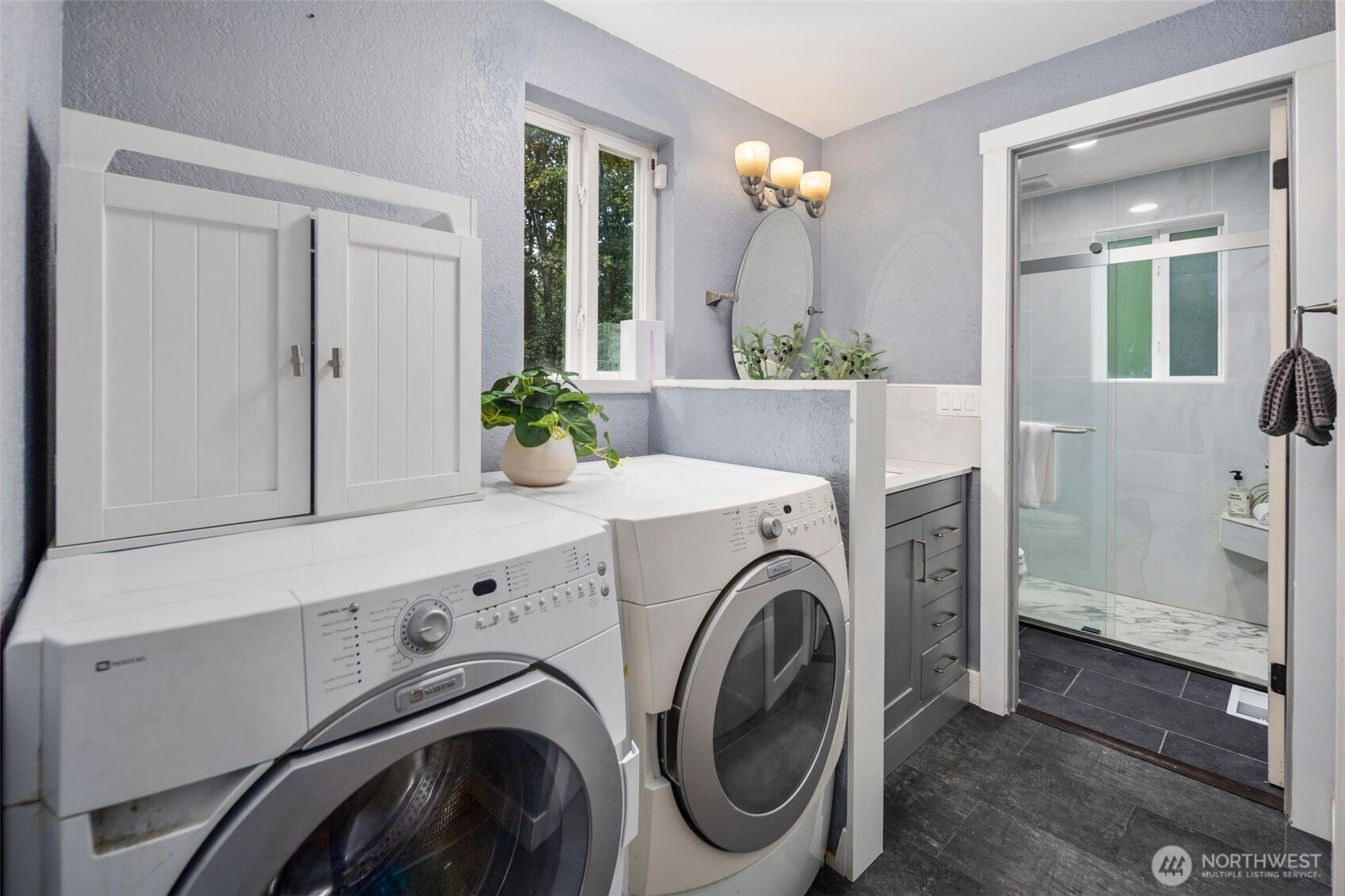 18016 Southeast 147th Street Renton, WA 98059 - Photo 22 of 38 a view of livingroom with washer and dryer
