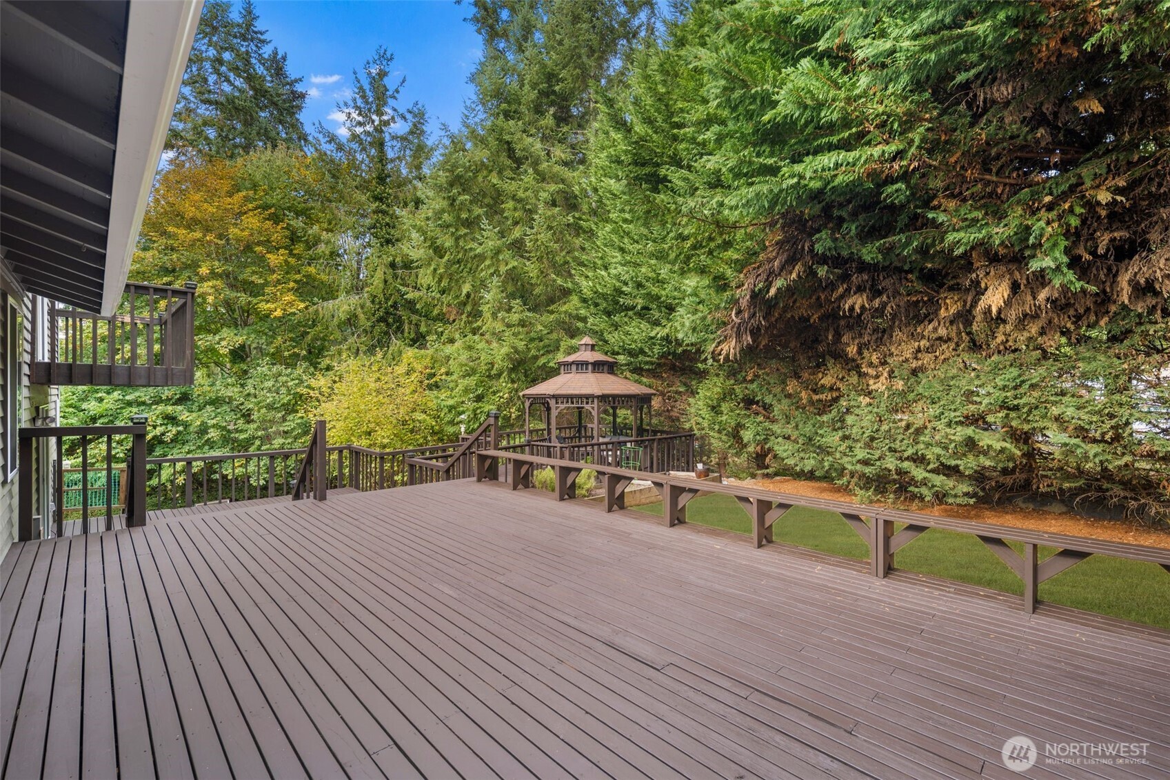 18016 Southeast 147th Street Renton, WA 98059 - Photo 27 of 38 a view of a terrace with a bench