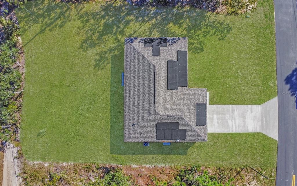 6949 Southwest 152nd Street Ocala, FL 34473 - Photo 18 of 20 an aerial view of a house with a yard
