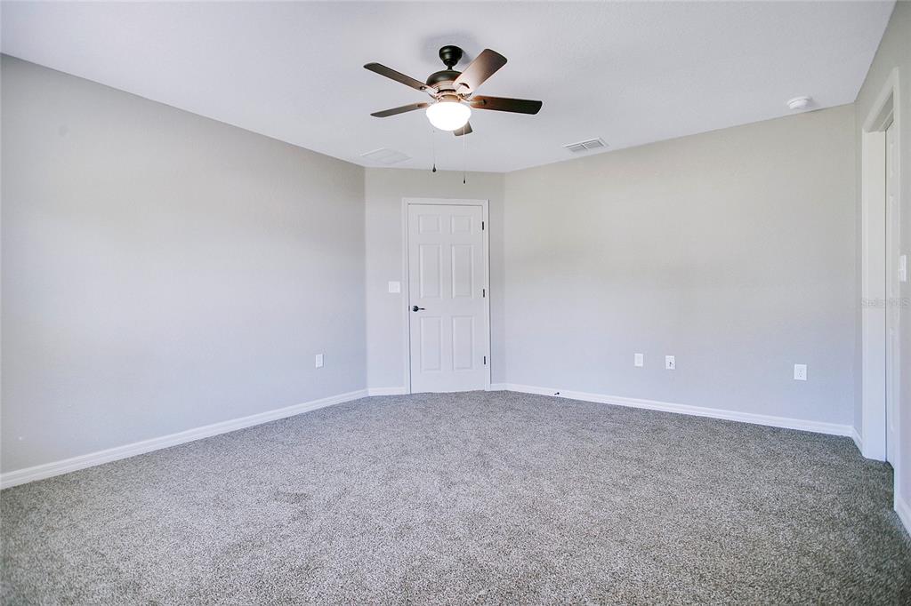 6949 Southwest 152nd Street Ocala, FL 34473 - Photo 10 of 20 a view of an empty room