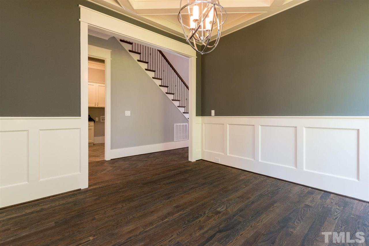 5000 Fanyon Way Raleigh, NC 27612 - Photo 13 of 25 CUSTOM TRIM PACKAGE with 7" crown moldings and 7" baseboards. Gorgeous coffered ceilings. All the trimmings without the turkey!
