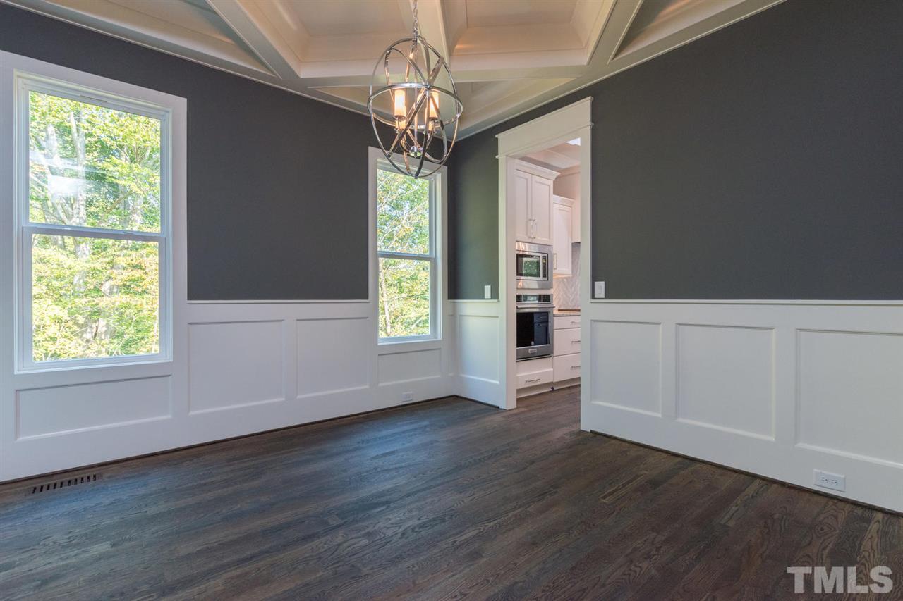 5000 Fanyon Way Raleigh, NC 27612 - Photo 8 of 25 Hardwood floors, wainscott and coffered ceilings