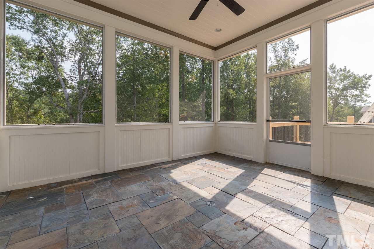 5000 Fanyon Way Raleigh, NC 27612 - Photo 10 of 25 Screened porch has Bead board on ceiling and knee walls.