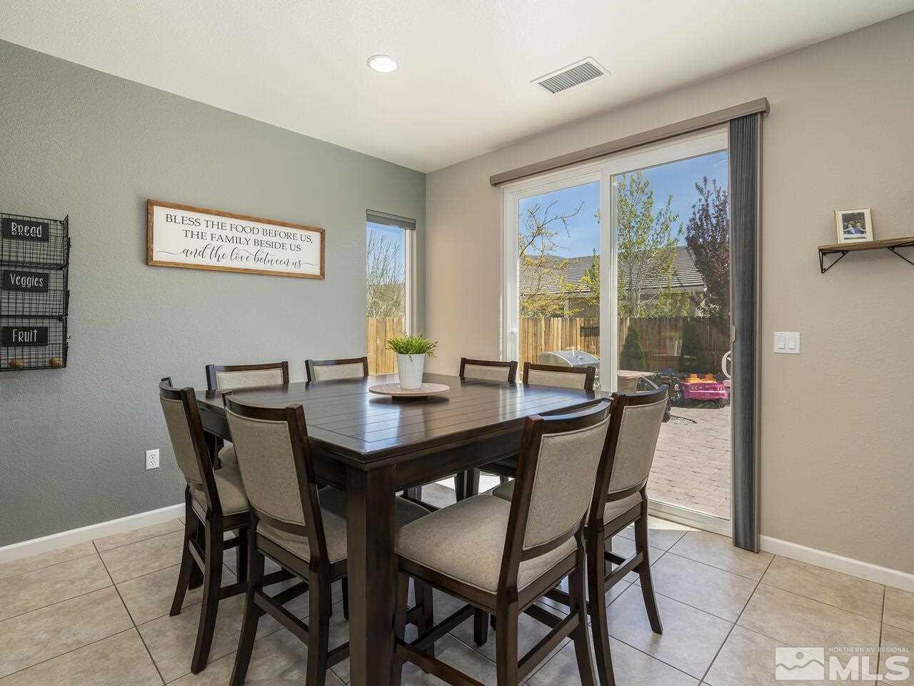2090 Tawleed Road Reno, NV 89521 - Photo 11 of 24 a view of a dining room with furniture window and outside view