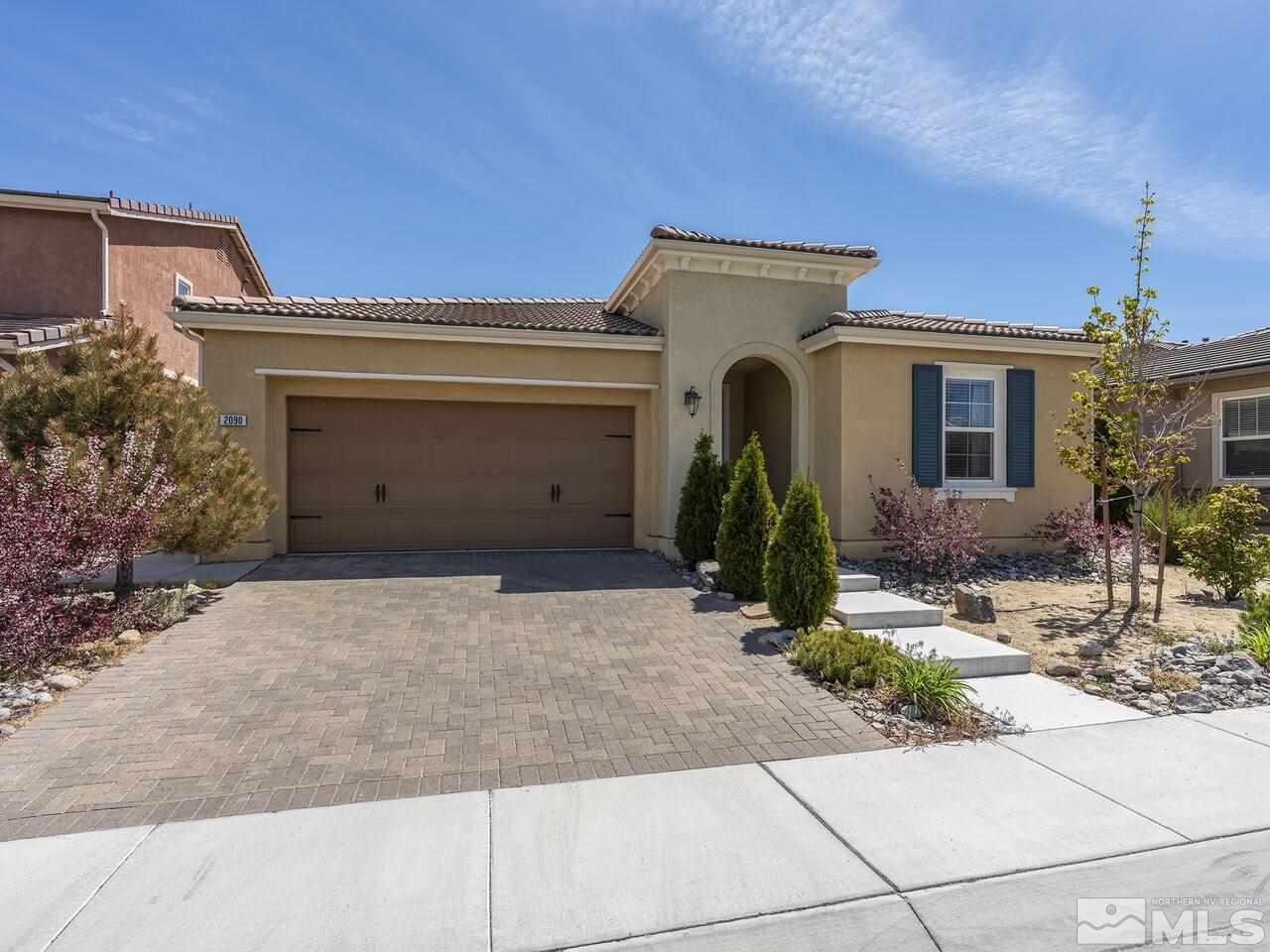 2090 Tawleed Road Reno, NV 89521 - Photo 2 of 24 a view of a house with potted plants