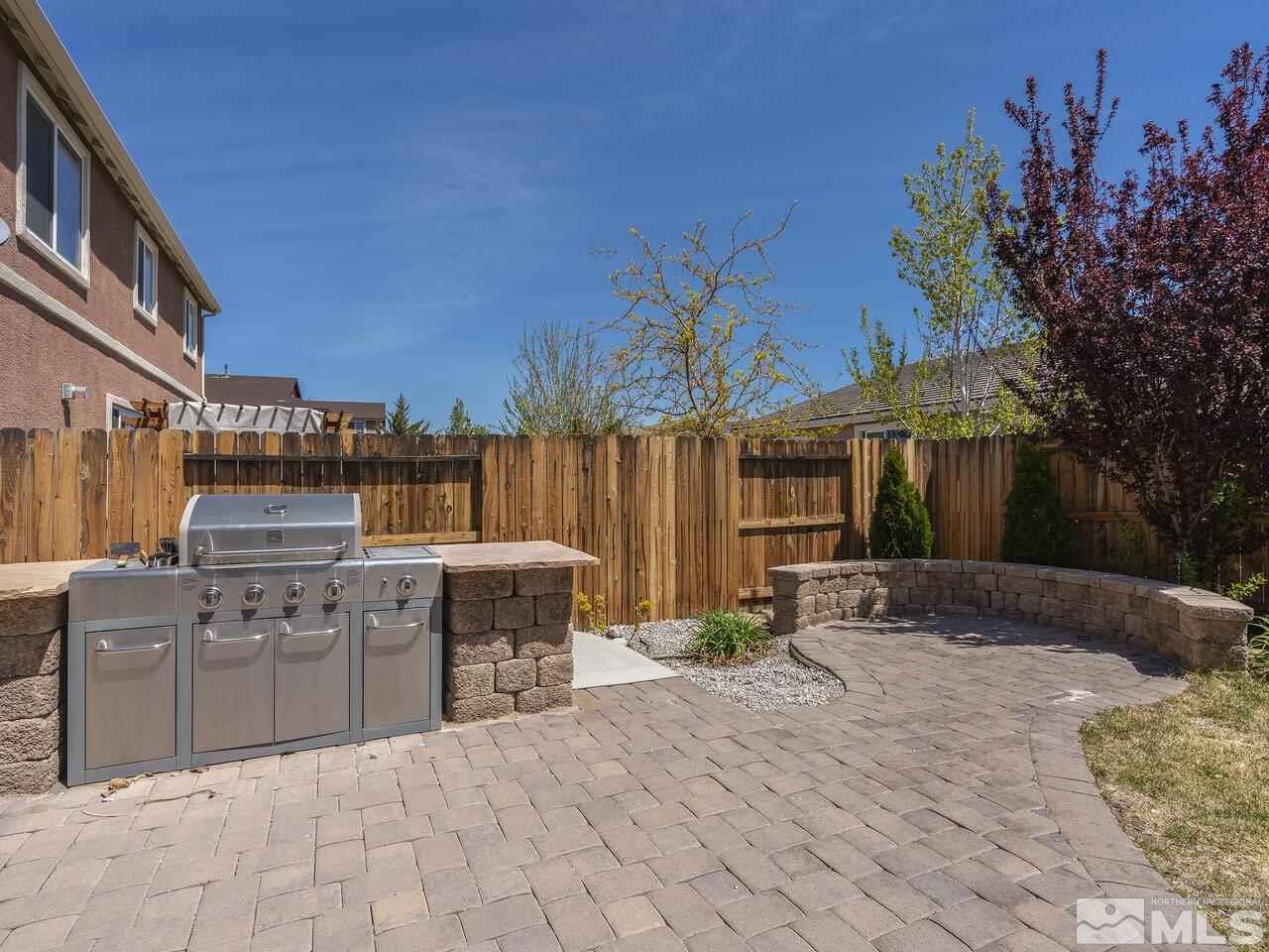 2090 Tawleed Road Reno, NV 89521 - Photo 21 of 24 a view of a backyard with sitting area