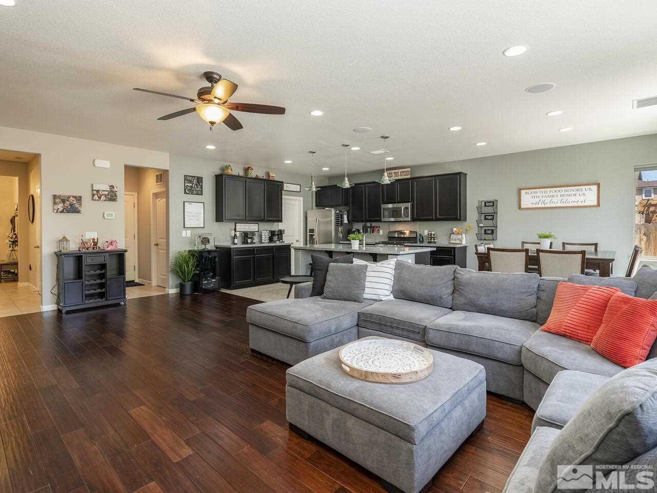 2090 Tawleed Road Reno, NV 89521 - Photo 6 of 24 a living room with furniture kitchen view and a wooden floor