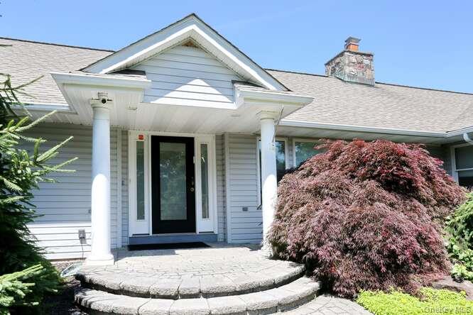 89 Spook Rock Road Suffern, NY 10901 - Photo 40 of 44 a view of a house with a porch