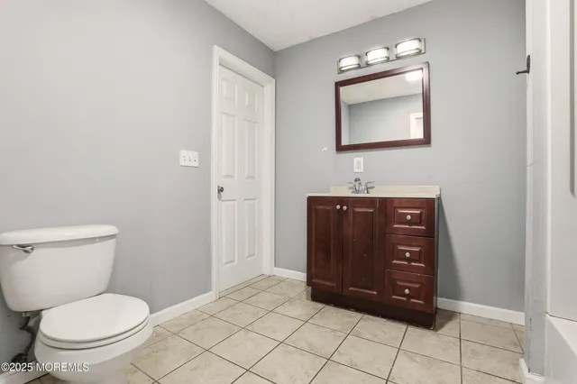 a bedroom with a bed and a cabinets