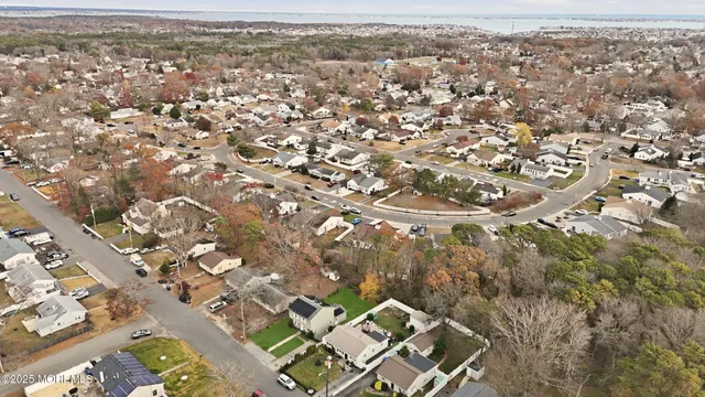 an aerial view of residential building and lake view