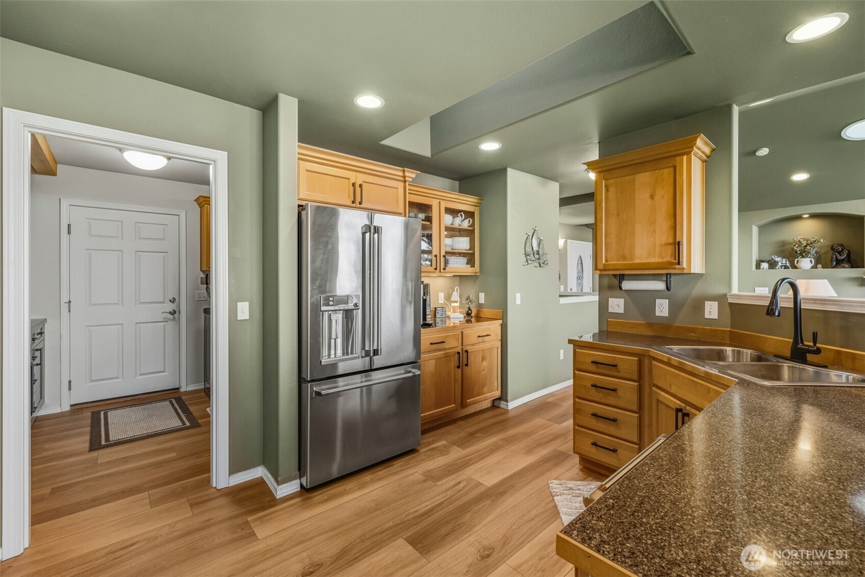 855 Louella Heights Road Sequim, WA 98382 - Photo 14 of 40 a kitchen with stainless steel appliances granite countertop a refrigerator and a stove top oven