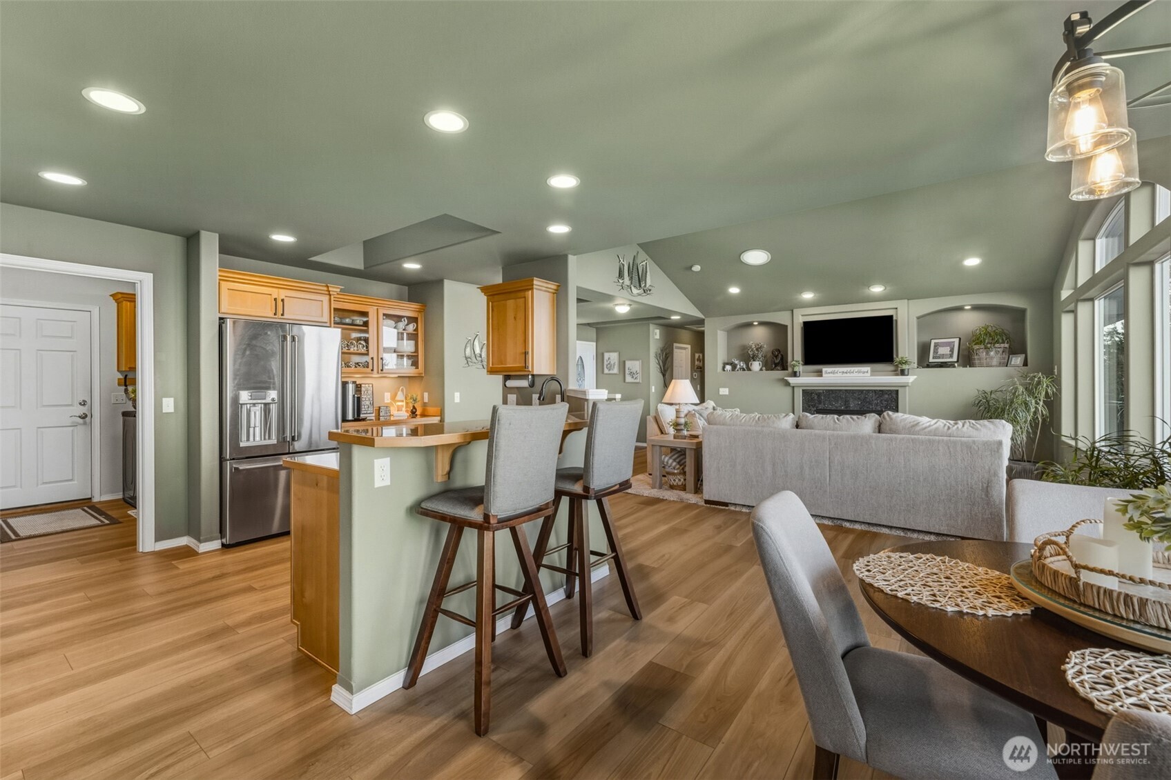 855 Louella Heights Road Sequim, WA 98382 - Photo 18 of 40 a living room with furniture and kitchen view
