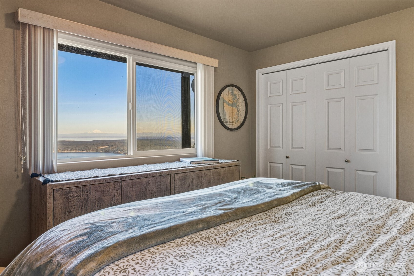 855 Louella Heights Road Sequim, WA 98382 - Photo 27 of 40 a bedroom with a bed and a window