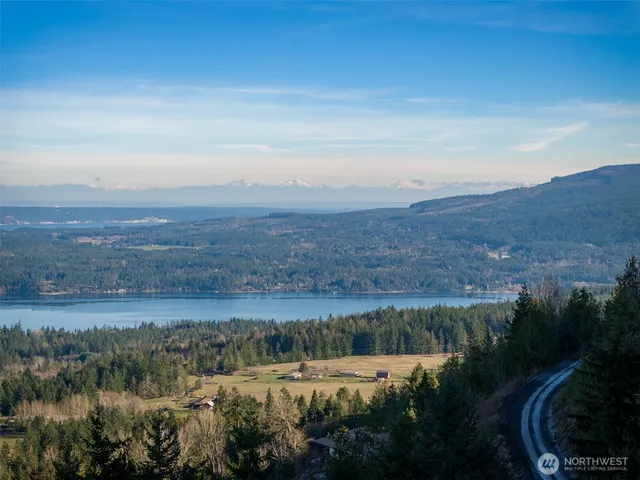 a view of mountain with lake view and mountain in the back