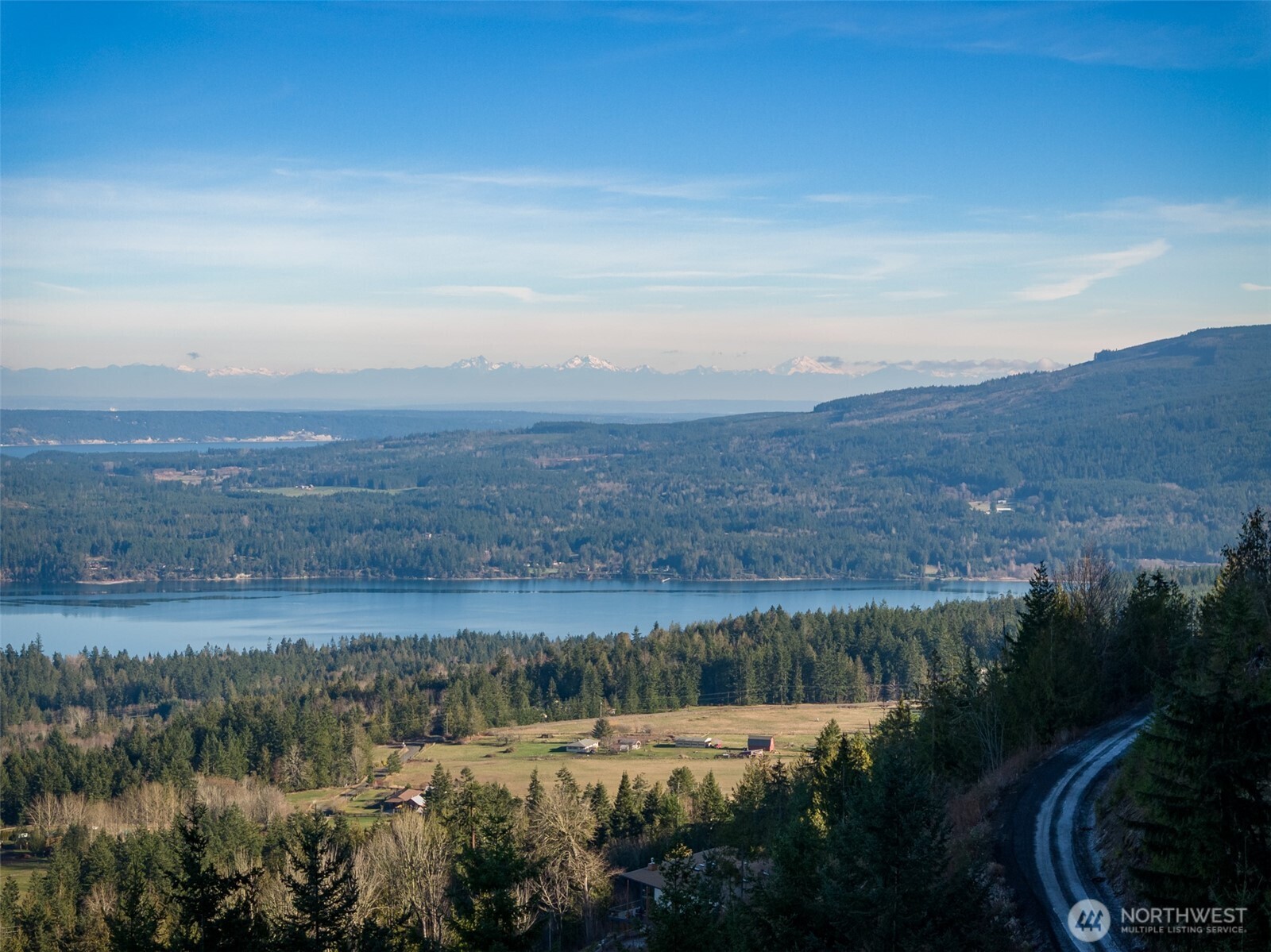 855 Louella Heights Road Sequim, WA 98382 - Photo 3 of 40 a view of mountain with lake view and mountain in the back