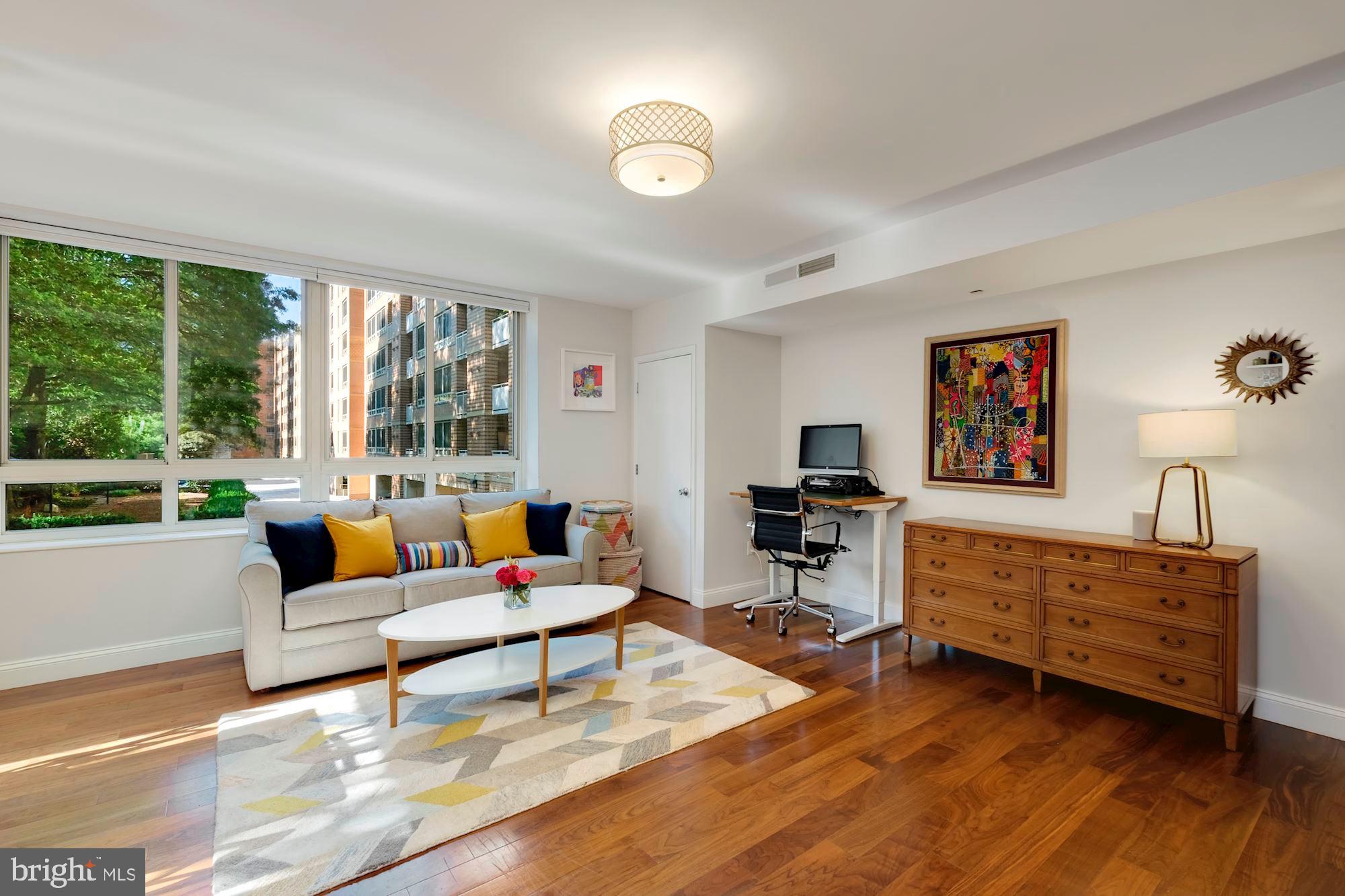 350 G Street Southwest, Unit N109 Washington, DC 20024 - Photo 3 of 29 Large living room with hardwood floors