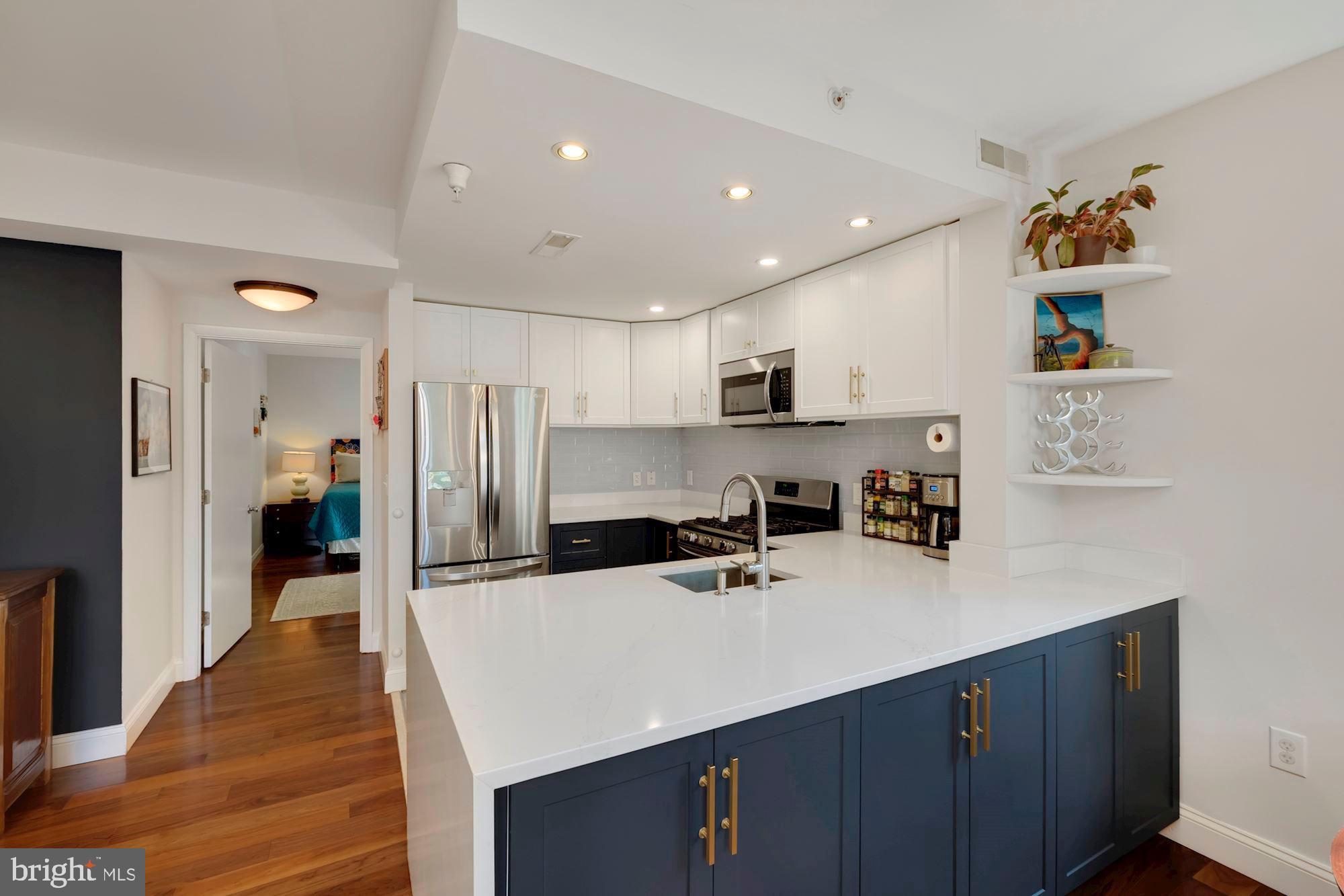 350 G Street Southwest, Unit N109 Washington, DC 20024 - Photo 9 of 29 Recently renovated kitchen with quartz counters