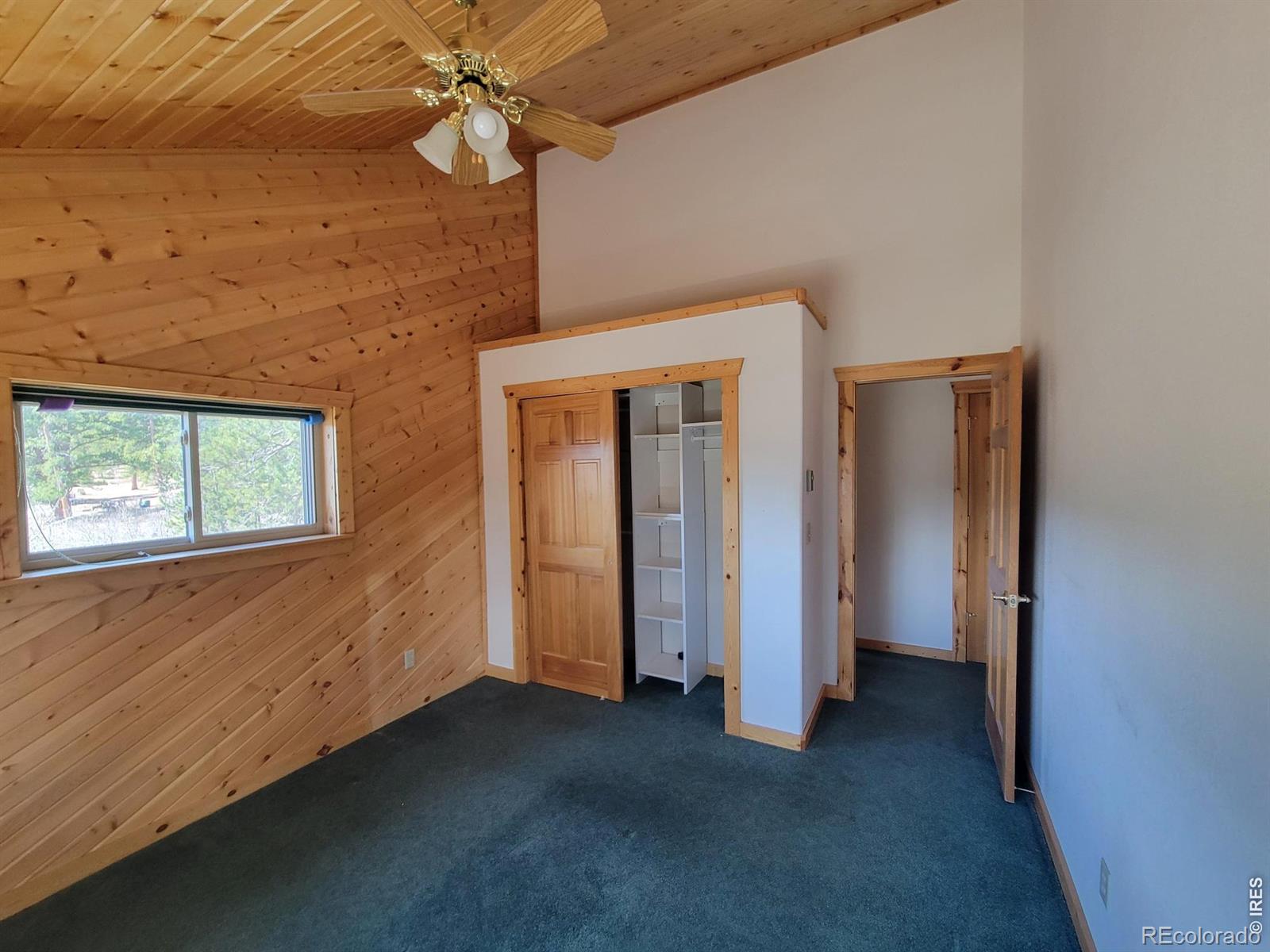 2225 North County Road Red Feather Lakes, CO 80545 - Photo 17 of 21 a view of empty room with ceiling fan