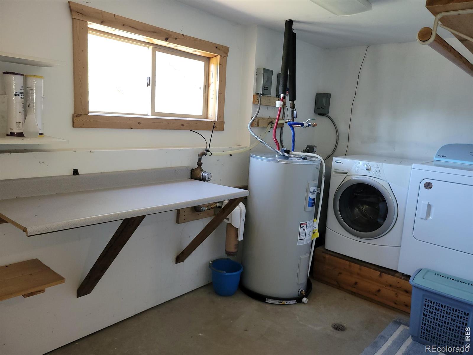 2225 North County Road Red Feather Lakes, CO 80545 - Photo 19 of 21 a utility room with dryer and washer