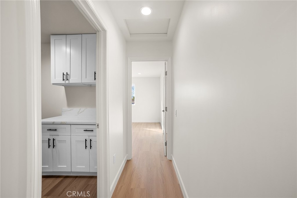306 West Congress Street Colton, CA 92324 - Photo 17 of 28 a view of hallway with wooden floor