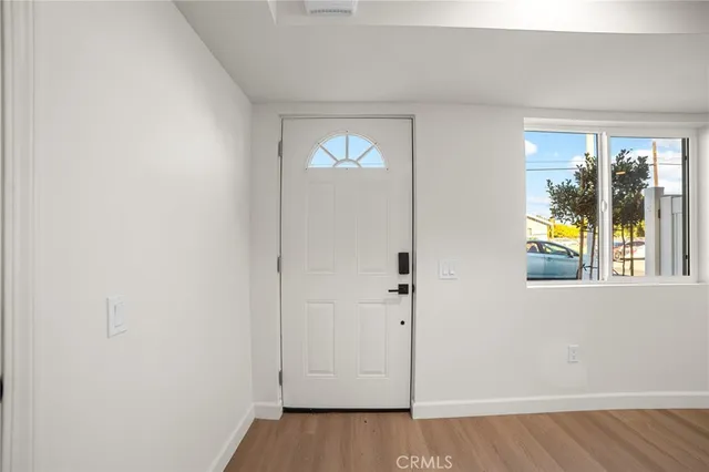 a view of an empty room and window