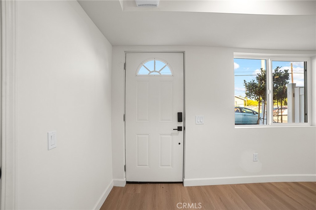 306 West Congress Street Colton, CA 92324 - Photo 2 of 28 a view of an empty room and window