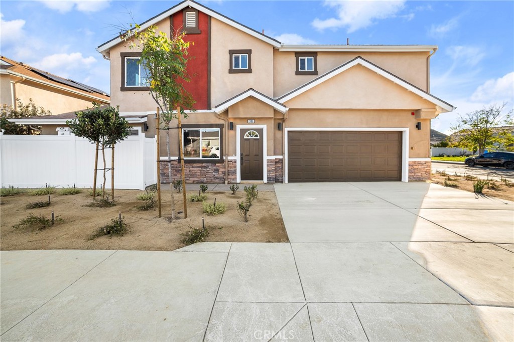 306 West Congress Street Colton, CA 92324 - Photo 28 of 28 a front view of a house with yard