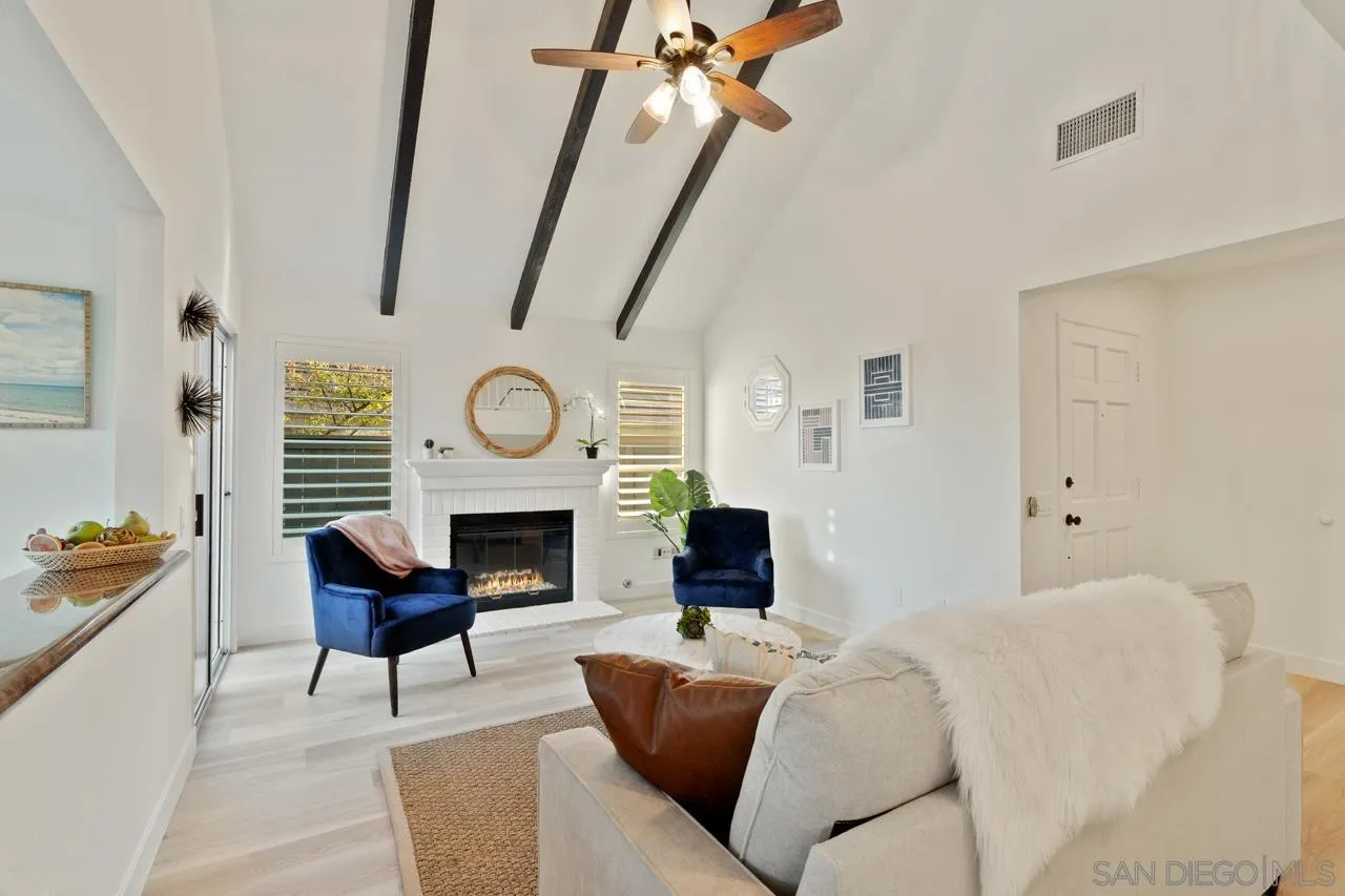 1904 Willow Ridge Drive Vista, CA 92081 - Photo 11 of 70 a living room with furniture a fireplace a rug and a window