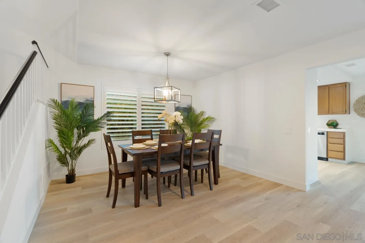 1904 Willow Ridge Drive Vista, CA 92081 - Photo 15 of 70 a view of a dining room with furniture and chandelier