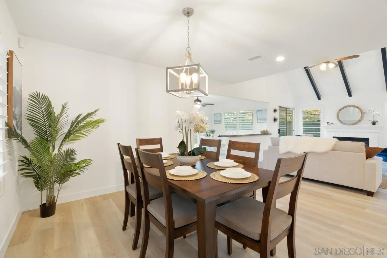 1904 Willow Ridge Drive Vista, CA 92081 - Photo 17 of 70 a view of a dining room with furniture window and wooden floor