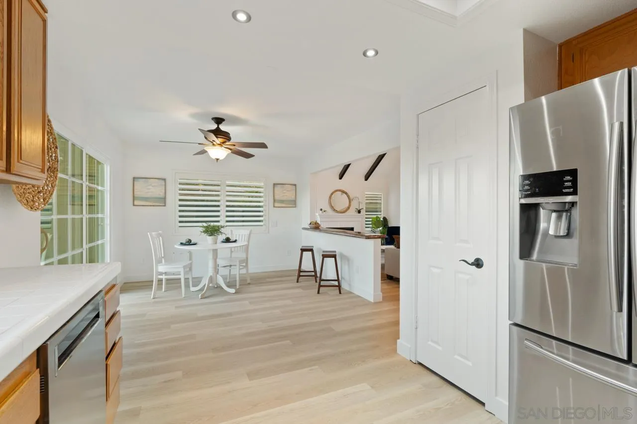 1904 Willow Ridge Drive Vista, CA 92081 - Photo 31 of 70 a living room with stainless steel appliances furniture and a window