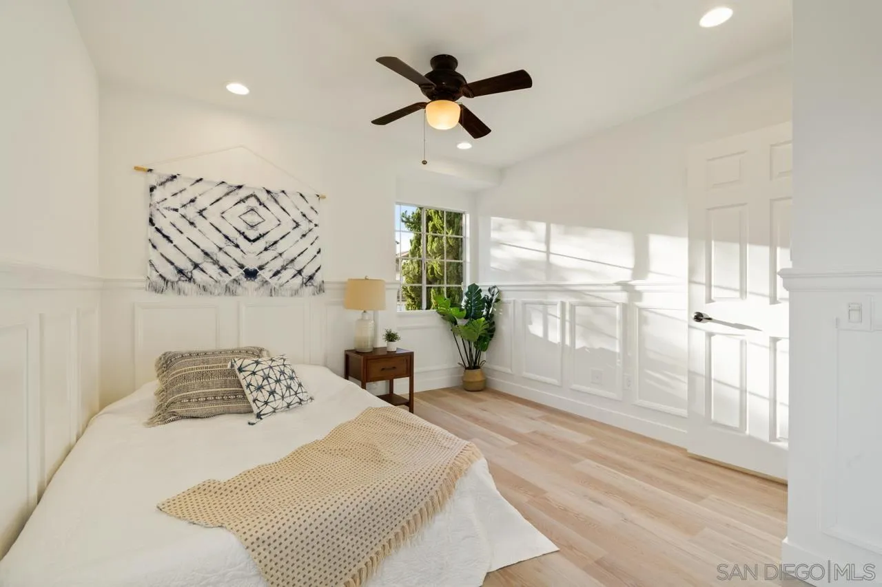 1904 Willow Ridge Drive Vista, CA 92081 - Photo 49 of 70 a bedroom with a large bed and a large window