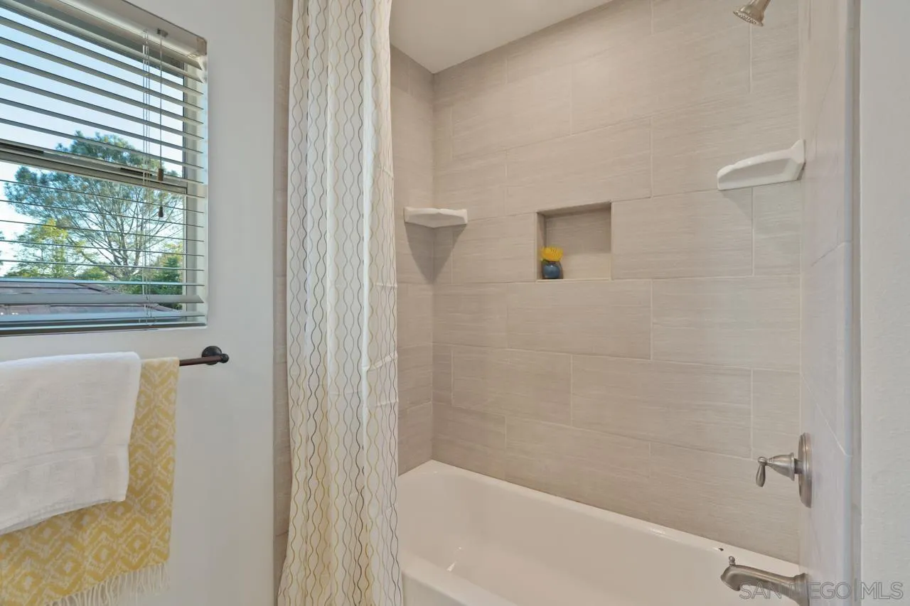 1904 Willow Ridge Drive Vista, CA 92081 - Photo 51 of 70 a bathroom with a bathtub