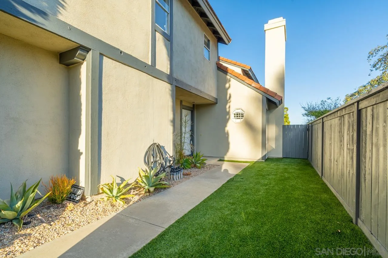 1904 Willow Ridge Drive Vista, CA 92081 - Photo 6 of 70 a front view of a house with garden