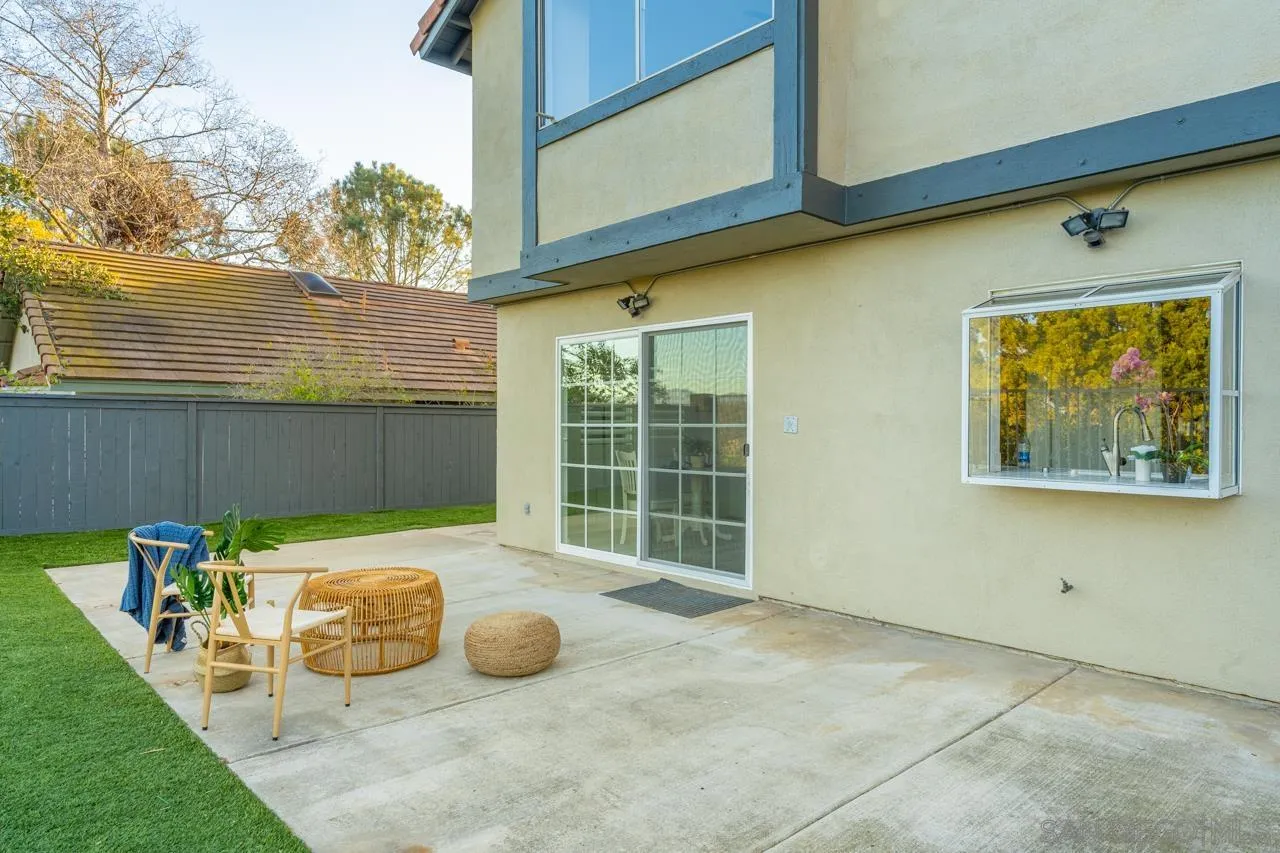 1904 Willow Ridge Drive Vista, CA 92081 - Photo 64 of 70 a view of a patio with a table and chairs