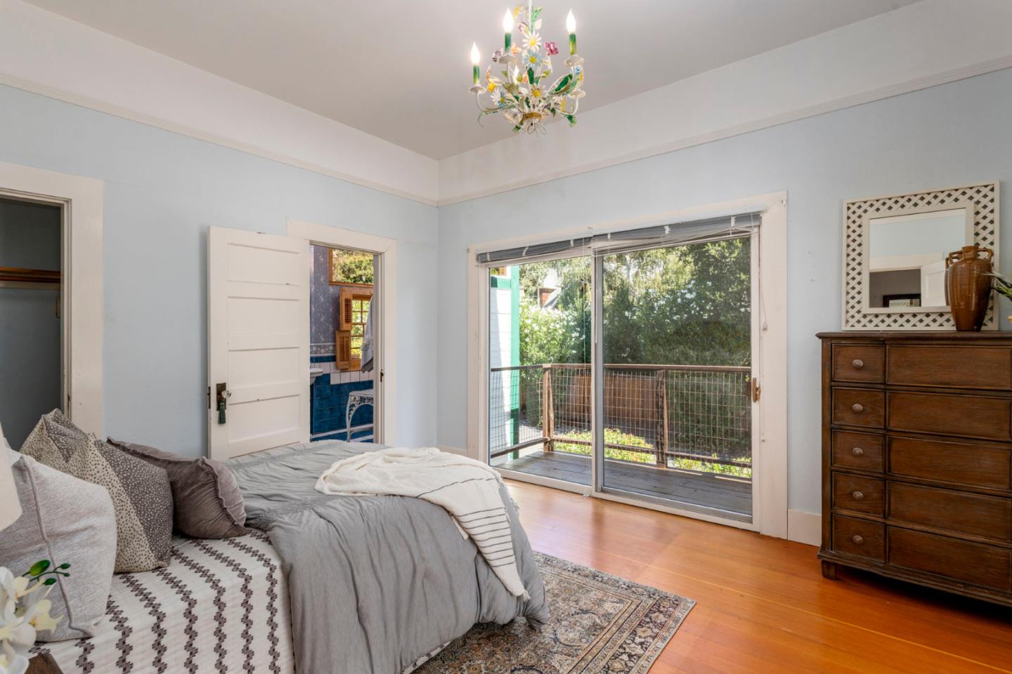 3190 Woodside Road Woodside, CA 94062 - Photo 23 of 34 a bedroom with a bed and a window