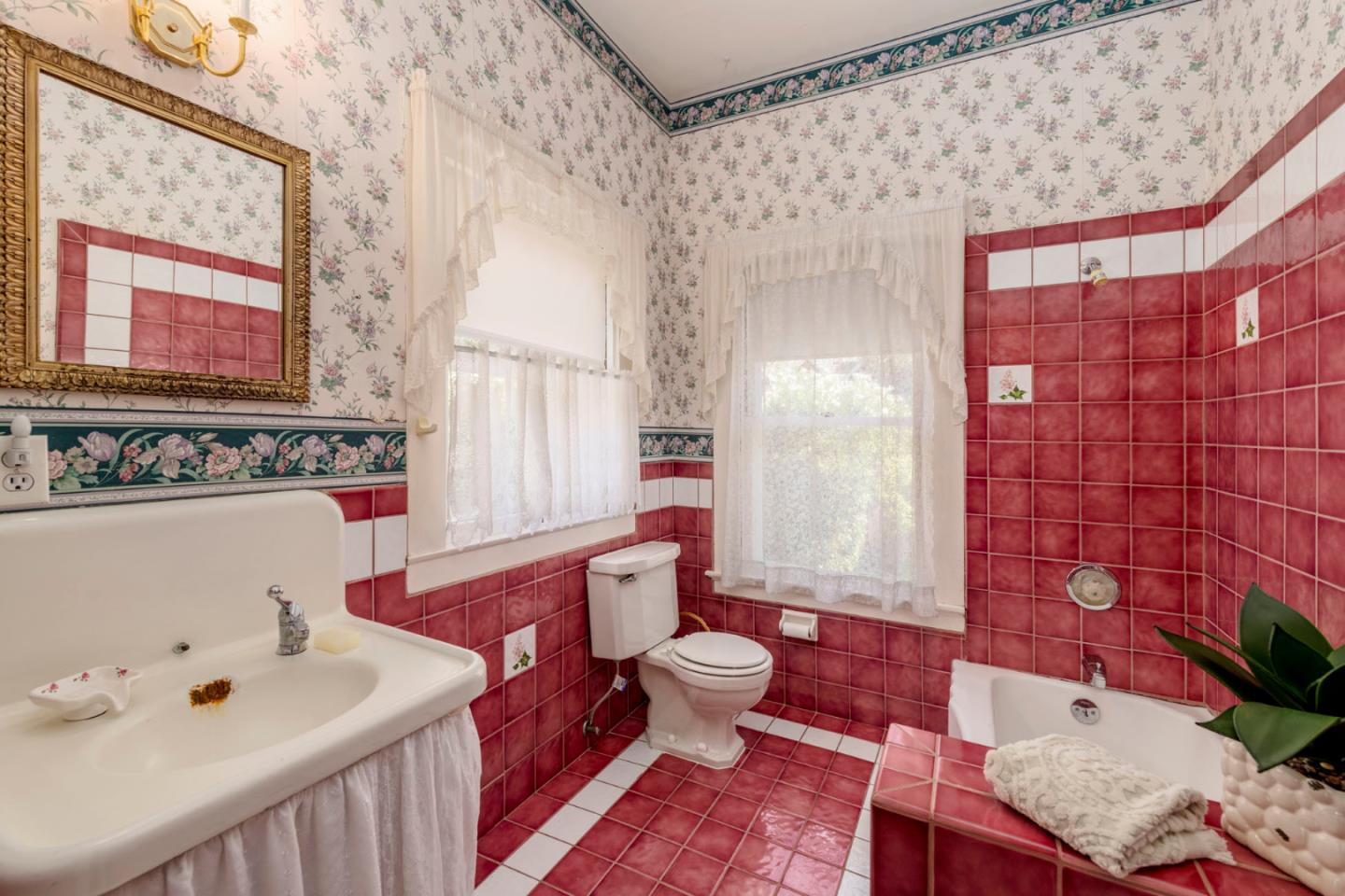 3190 Woodside Road Woodside, CA 94062 - Photo 24 of 34 a bathroom with a sink and a mirror