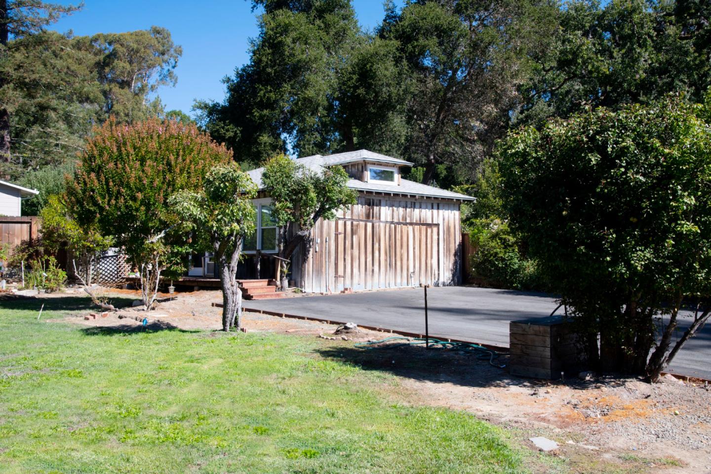 3190 Woodside Road Woodside, CA 94062 - Photo 25 of 34 a view of a backyard with sitting area